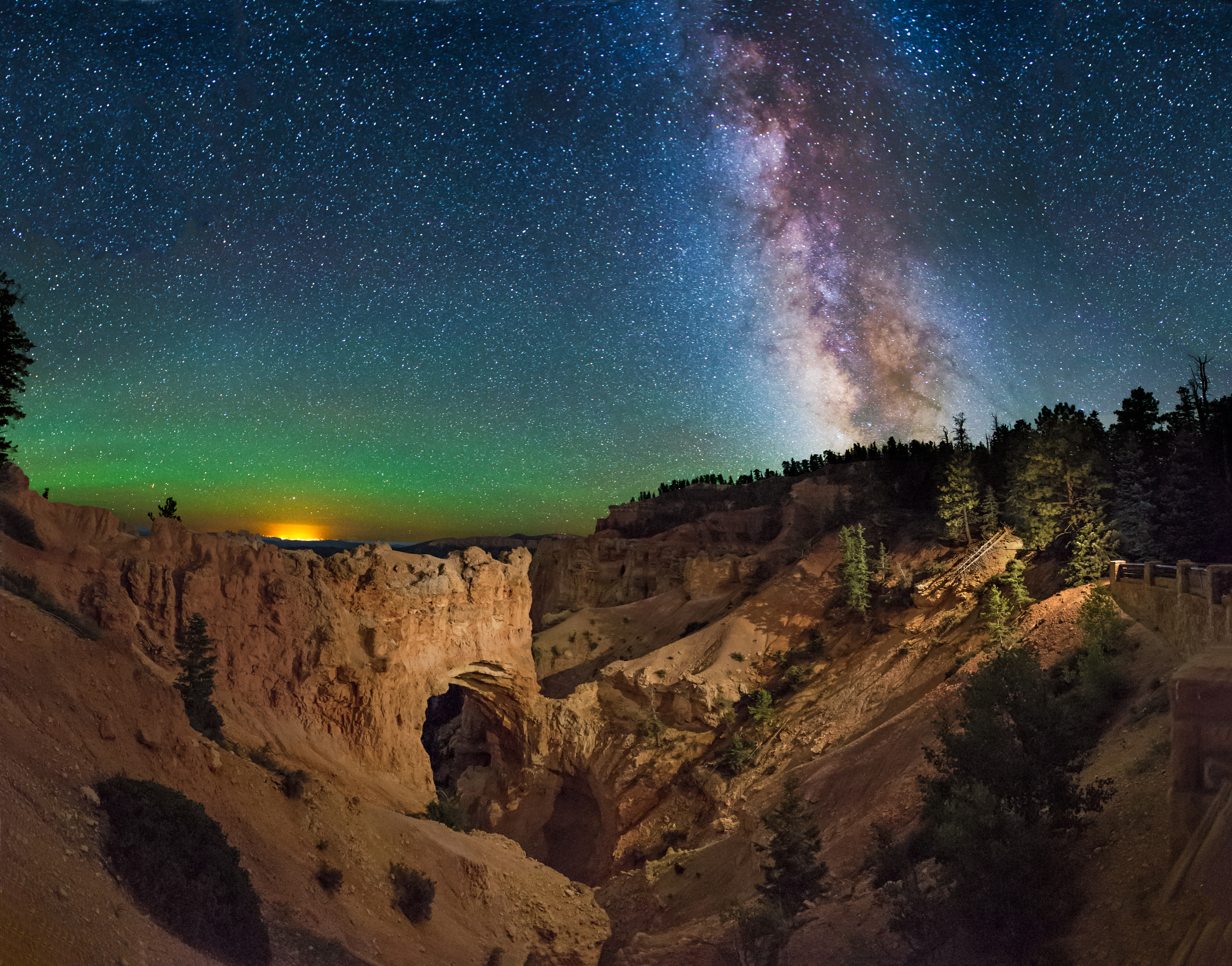 Natural Bridge Arch in Bryca Canyon National Park, with the Milky Way above. This is a panorama of 8 vertical images taken with a Canon 6D camera, Canon 16-35 mm 2.8 lens at 16 mm, f/2.8, 30 sec exposures, and ISO 6400. Hope you enjoy! After Midnight Landscapes //Facebook